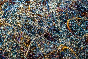 Metal spiral shavings background closeup